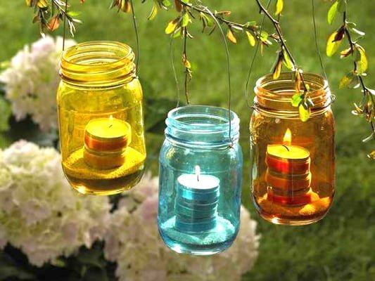 Make outdoor hanging lights from jam jars