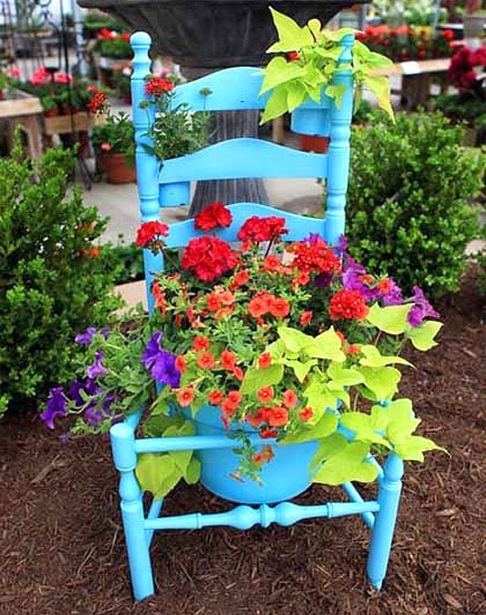 Colourful recycled chair planter