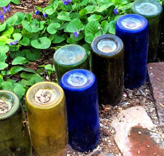 Garden border made from old wine bottles