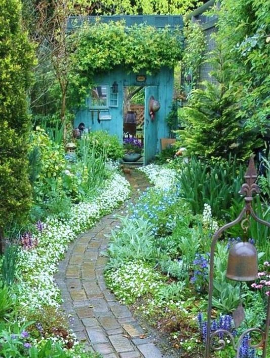 Beautiful garden path to a shed